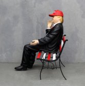 Donald Trump on Bench Wearing MAGA Hat