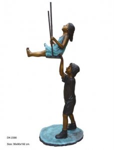 Boy & Girl on Swing