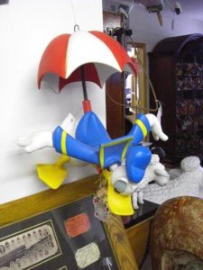 Donald Duck parachuting with umbrella