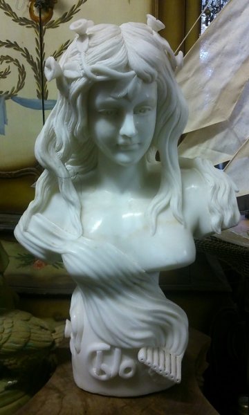 White marble bust of a young Girl