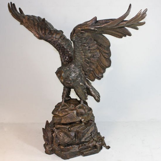 Bronze Eagle Landing on a Rock - Click Image to Close