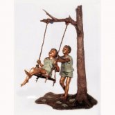 Bronze Kids On A Tree Swing