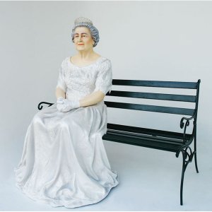 Queen Sitting on Bench