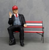 Donald Trump on Bench Wearing MAGA Hat